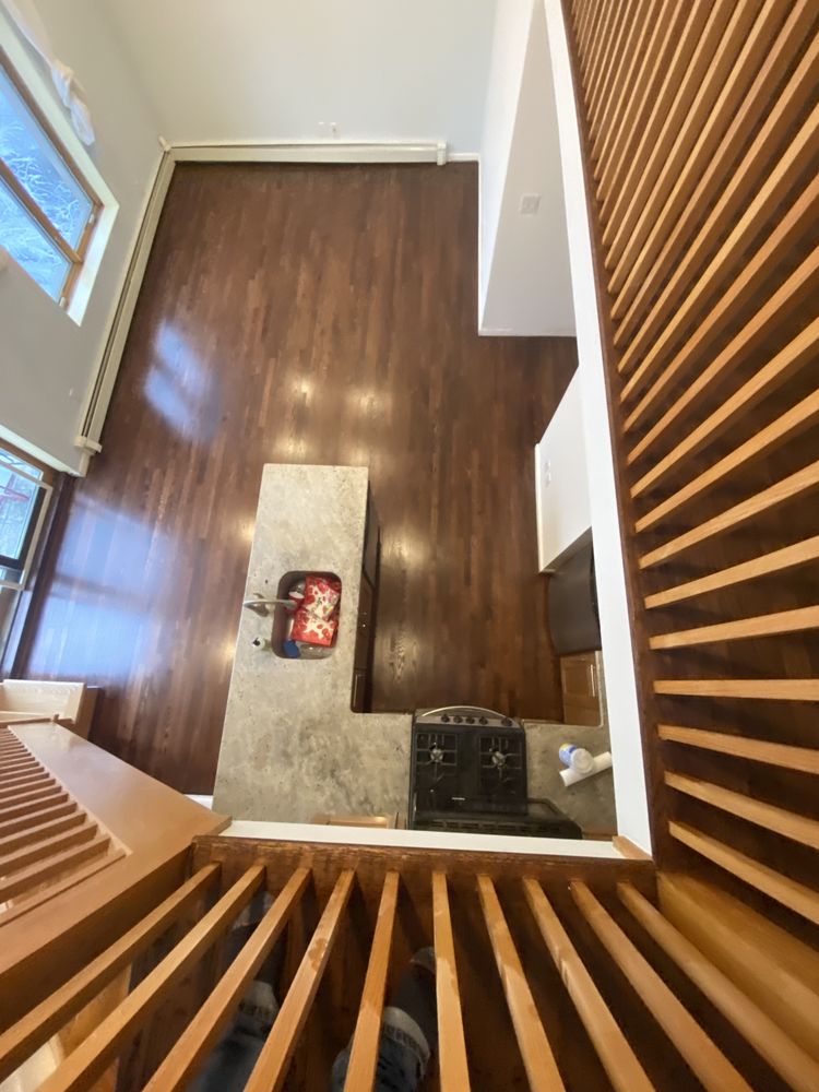 Wide plank white oak hardwood flooring in luxury living room