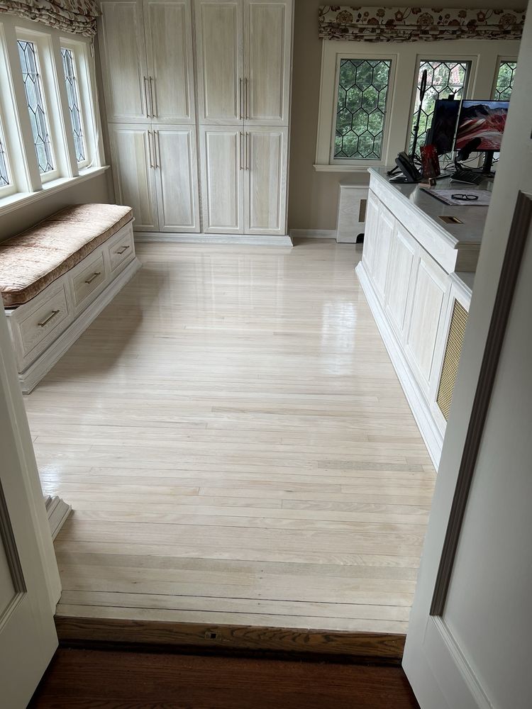 Wide plank white oak flooring in American luxury open-plan living room